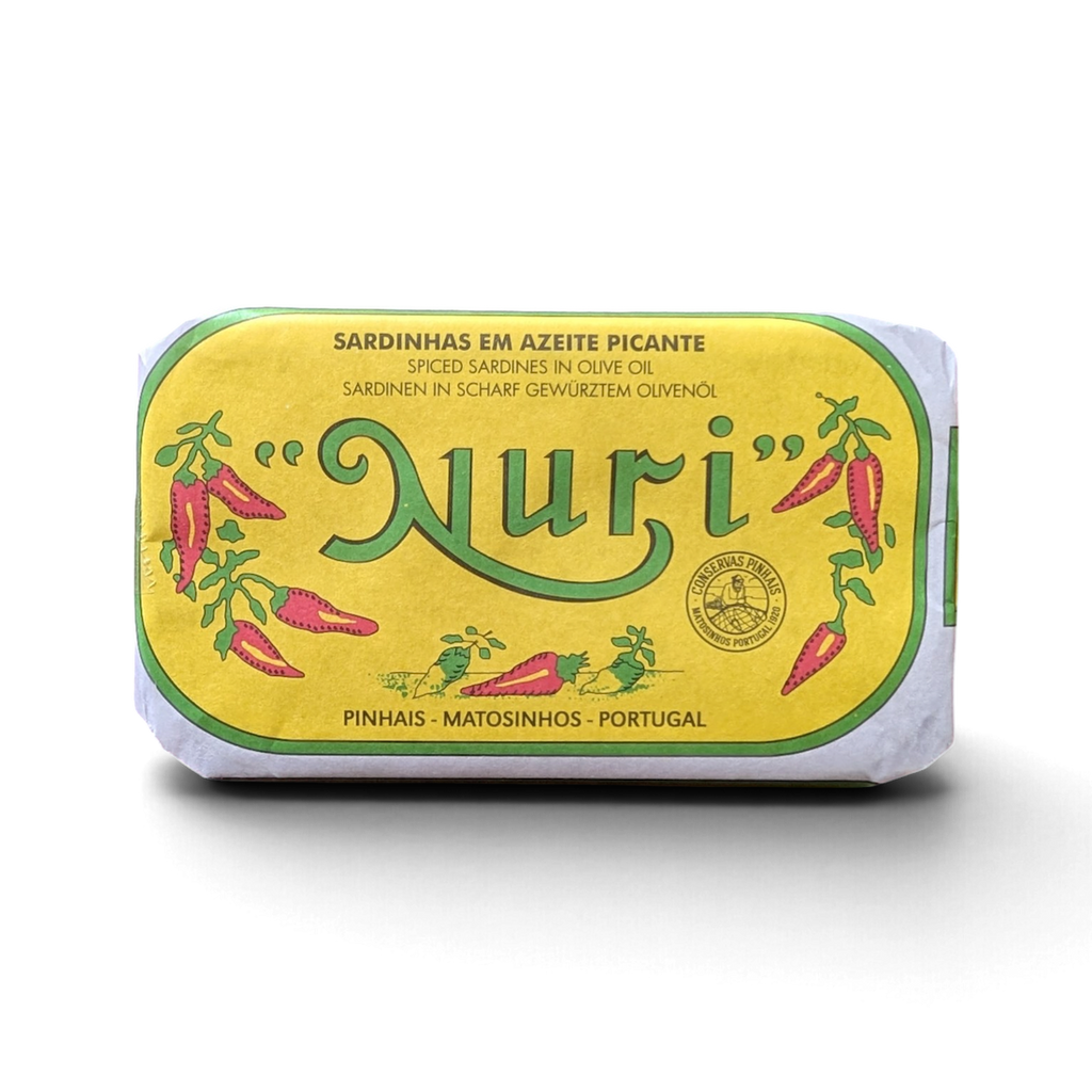 Front of a tin of Nuri Spiced Sardines in Olive Oil